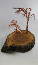 Product Description: Artistic Trees crafted from slabs from the Derecho created by a local artist Young Jimages.</br></br>Pick Up only- Resource Center- 1150 27th Ave SW Cedar Rapids, Iowa 52404</br> Artistic Tree-5