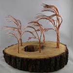 Product Description: Artistic Trees crafted from slabs from the Derecho created by a local artist Young Jimages.</br></br>Pick Up only- Resource Center- 1150 27th Ave SW Cedar Rapids, Iowa 52404</br> Artistic Tree-9