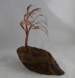 Product Description: Artistic Trees crafted from slabs from the Derecho created by a local artist Young Jimages.</br></br>Pick Up only- Resource Center- 1150 27th Ave SW Cedar Rapids, Iowa 52404</br> Artistic Tree-1