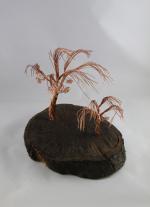 Product Description: Artistic Trees crafted from slabs from the Derecho created by a local artist Young Jimages.</br></br>Pick Up only- Resource Center- 1150 27th Ave SW Cedar Rapids, Iowa 52404</br> Artistic Tree-3